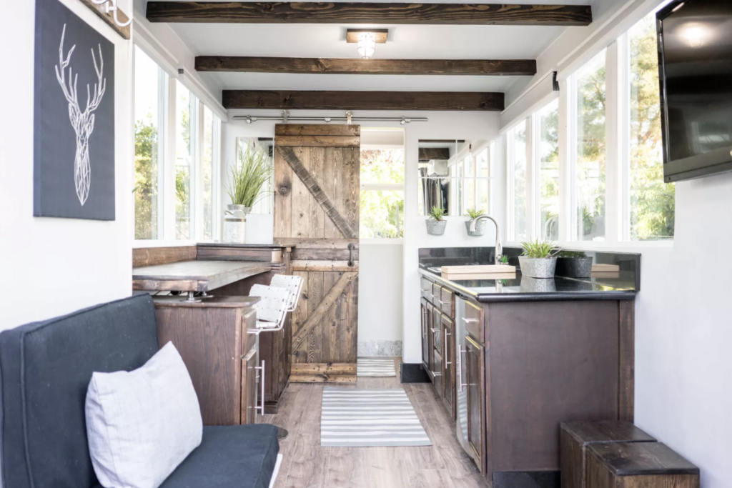 Wood accents and sliding door for cozy feel